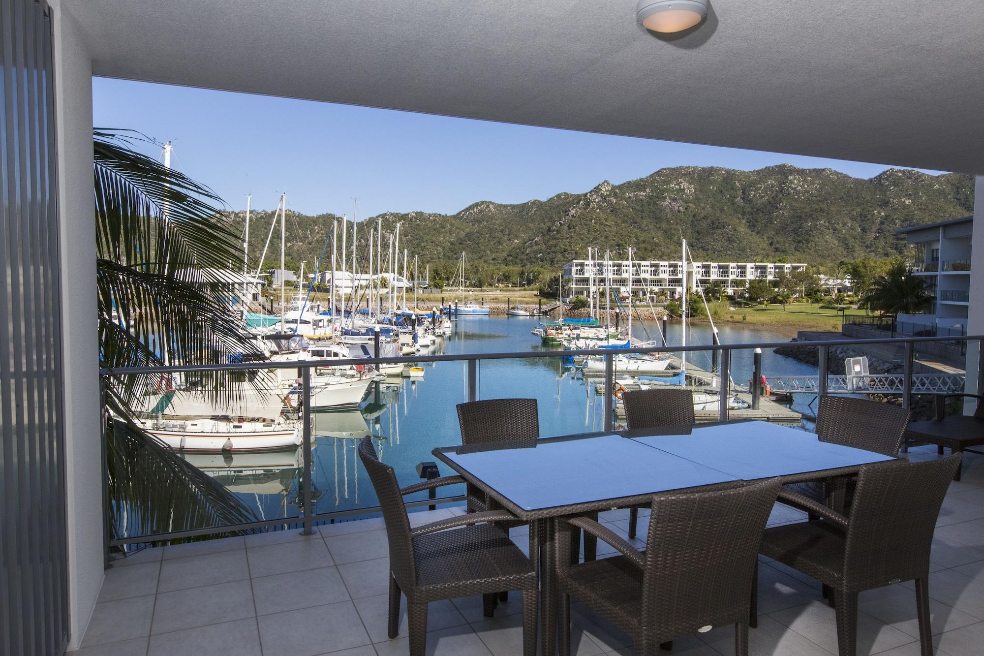 Peppers Blue On Blue Hotel Nelly Bay Exterior photo View of the marina from a private balcony